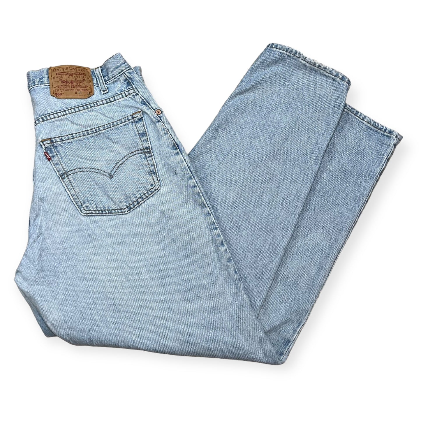 1990's Levi's 560 loose fit tapered light wash denim pants (36X35)